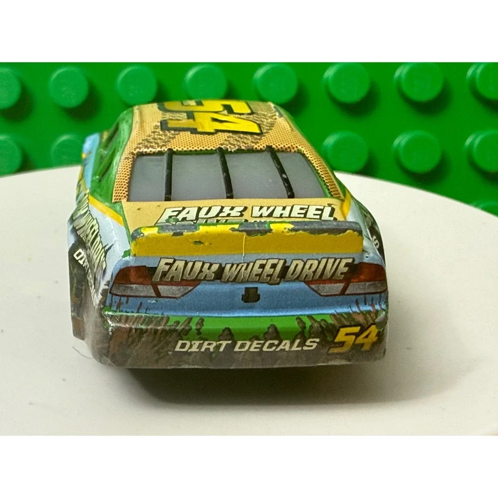 Disney Pixar Cars Herb Curbler 54 Faux Wheel Drive Dirt Decals Diecast Car